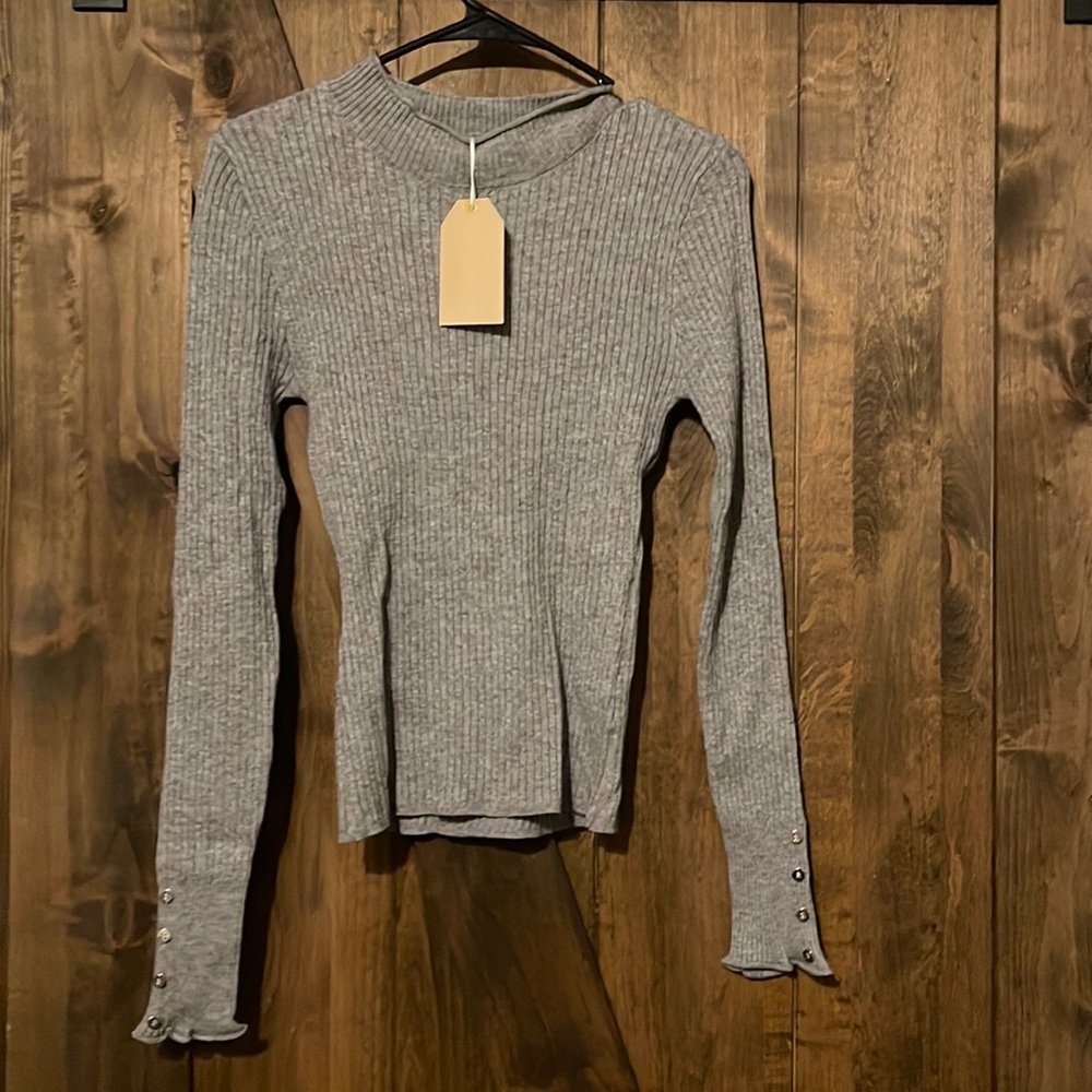 Grey turtleneck.